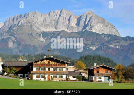 Austria, Tyrol, Oberndorf im Tyrol, Alpine scenery and cottage before the Wilder Kaiser mountains Stock Photo