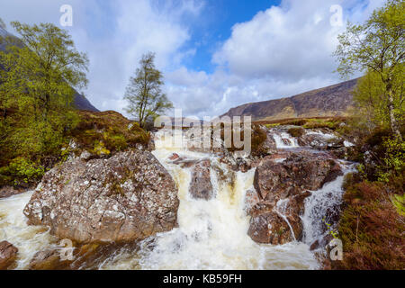 Waterfall on river Coupal and mountain range Buachaille Etive Mor, Glen Coe, Scotland, United Kingdom Stock Photo