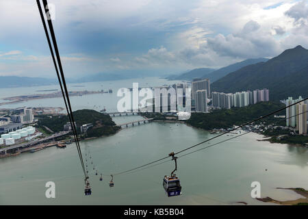 The Ngong Ping 360 is a gondola lift to the Tian Tan big Buddha park in Lantau island. Stock Photo