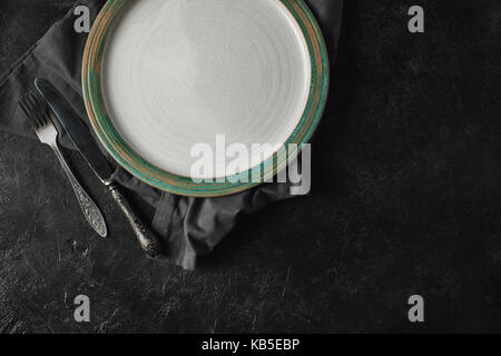 silverware and plate on linen Stock Photo