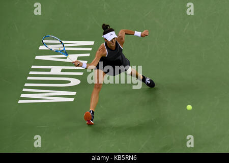 Wuhan, China. 28th Sep, 2017. Garbine Muguruza of Spain returns the ball during the singles quarterfinal match against Jelena Ostapenko of Latvia at 2017 WTA Wuhan Open in Wuhan, capital of central China's Hubei Province, on Sept. 28, 2017. (Xinhua/Ou Dongqu) Credit: Xinhua/Alamy Live News Stock Photo
