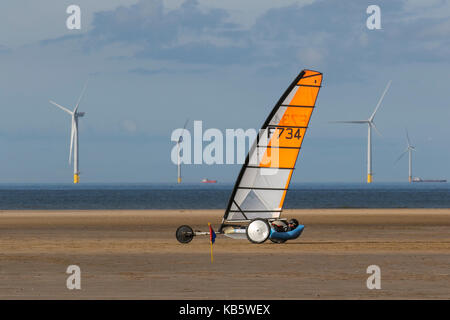 Hoylake, The Wirral, UK. 28th Sep, 2017. The European Sand Yacht Championships in conditions of low winds on the coast. Class2 & Class 3 yachts compete in the International events. Competitors competed in a series of races in varying wind and beach conditions culminating in the award of the accolade of European Champion in each of the 3 sand yacht classes. Credit; Credit: MediaWorldImages/Alamy Live News Stock Photo