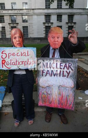 London, UK. 28th Sep, 2017.Protesters from Stop the War and CND outside Downing Street call on the UK government to stop the nuclear brinkmanship & call for negotiations to end US-North Korea crisis. Credit: claire doherty/Alamy Live News Stock Photo