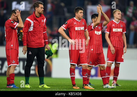 Cologne, Germany. 28th Sep, 2017. Cologne's Matthias Lehmann (L-R), substitute goalkeeper Thomas Kessler, Dominique Heintz, Milos Jojic and Frederik Sörensen stand defeated after the Europa League match between 1.FC Cologne vs. Red Star Belgrade at the RheinEnergieStadium in Cologne, Germany, 28 September 2017. Credit: Federico Gambarini/dpa/Alamy Live News Stock Photo