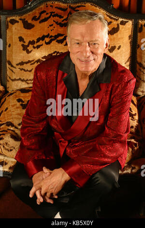 Playboy founder Hugh Hefner is photographed at the entrance to his
