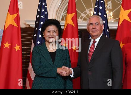 Washington, DC, USA. 28th Sep, 2017. Chinese Vice Premier Liu Yandong shakes hands with U.S. Secretary of State Rex Tillerson at the U.S. Department of State in Washington, DC Sept. 28, 2017. The first China-U.S. Social and People-to-People Dialogue was held on Thursday in Washington. The event was co-chaired by Liu Yandong and Rex Tillerson. Credit: Yin Bogu/Xinhua/Alamy Live News Stock Photo