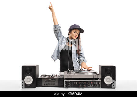 Female DJ playing music on a turntable isolated on white background Stock Photo