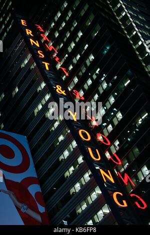 Huge illuminated neon sign of the accounting firm Ernst & Young at Times Square in Manhattan, in November 2008. | usage worldwide Stock Photo