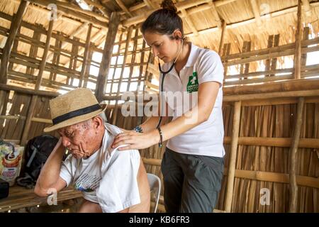 Mindoro is an island in the west of the Philippines. The indigenous peoples of the province are the Mangyans, they live off civilization areas and avoid contact with other islanders. Only the German Doctors come regularly and provide medical assistance. Ap | usage worldwide Stock Photo