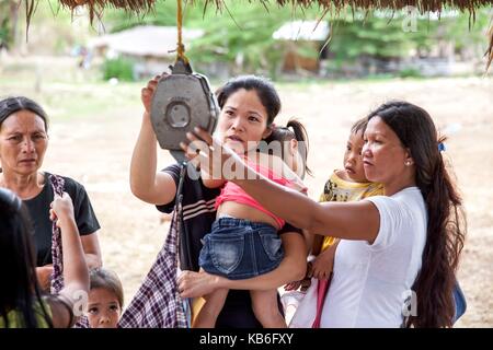 Mindoro is an island in the west of the Philippines. The indigenous peoples of the province are the Mangyans, they live off civilization areas and avoid contact with other islanders. Only the German Doctors come regularly and provide medical assistance. Ap | usage worldwide Stock Photo