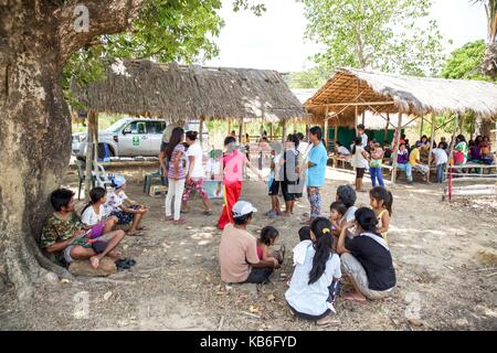 Mindoro is an island in the west of the Philippines. The indigenous peoples of the province are the Mangyans, they live off civilization areas and avoid contact with other islanders. Only the German Doctors come regularly and provide medical assistance. Ap | usage worldwide Stock Photo