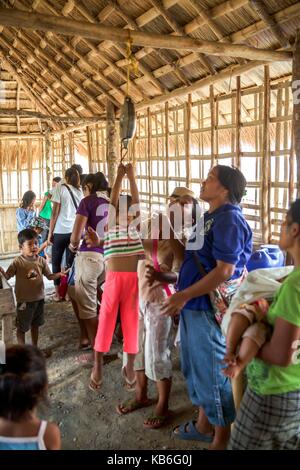 Mindoro is an island in the west of the Philippines. The indigenous peoples of the province are the Mangyans, they live off civilization areas and avoid contact with other islanders. Only the German Doctors come regularly and provide medical assistance. Ap | usage worldwide Stock Photo