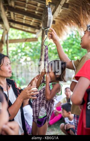 Mindoro is an island in the west of the Philippines. The indigenous peoples of the province are the Mangyans, they live off civilization areas and avoid contact with other islanders. Only the German Doctors come regularly and provide medical assistance. Ap | usage worldwide Stock Photo