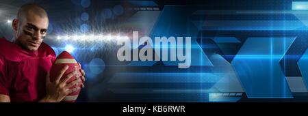 Digital composite of American football player with futuristic transition Stock Photo