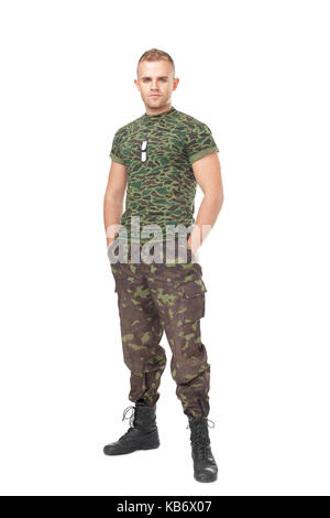 Full length portrait of serious army soldier isolated on white background Stock Photo