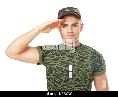 Full length portrait of young army soldier saluting isolated on white background Stock Photo