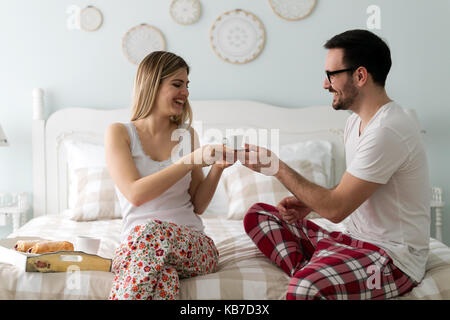 Picture of of happy young couple spending morning together Stock Photo