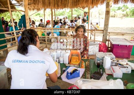 Mindoro is an island in the west of the Philippines. The indigenous peoples of the province are the Mangyans, they live off civilization areas and avoid contact with other islanders. Only the German Doctors come regularly and provide medical assistance. Ap | usage worldwide Stock Photo