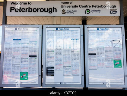 National Rail notice board of train times (timetable) on display at Peterborough railway station, Cambridgeshire, England, UK. Stock Photo