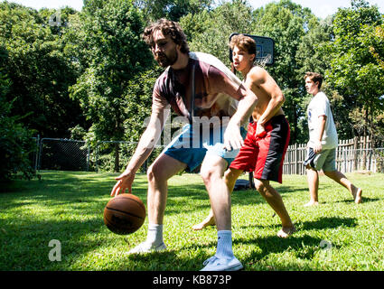 Brothers Playing Basketball Stock Photo