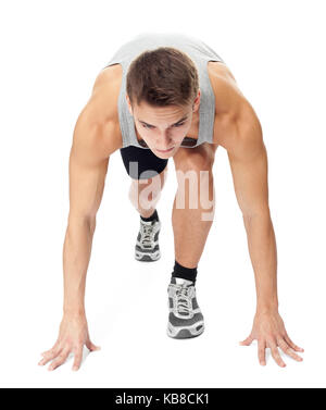 Full length portrait of athlete man ready to run isolated on white background Stock Photo