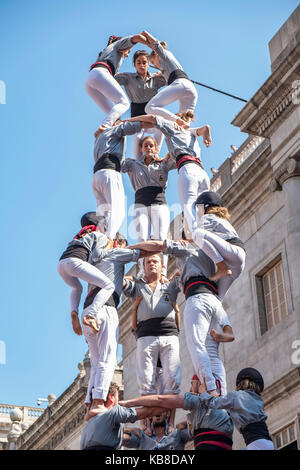 One of Catalonia’s most famous traditions is that of the “castells” (castles), which are human towers that are lifted by building different levels of  Stock Photo