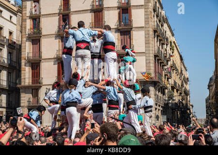 One of Catalonia’s most famous traditions is that of the “castells” (castles), which are human towers that are lifted by building different levels of  Stock Photo