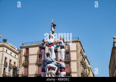 One of Catalonia’s most famous traditions is that of the “castells” (castles), which are human towers that are lifted by building different levels of  Stock Photo