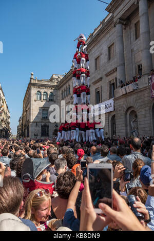 One of Catalonia’s most famous traditions is that of the “castells” (castles), which are human towers that are lifted by building different levels of  Stock Photo