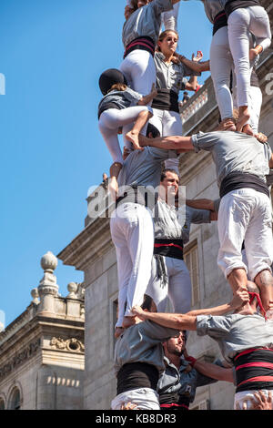 One of Catalonia’s most famous traditions is that of the “castells” (castles), which are human towers that are lifted by building different levels of  Stock Photo