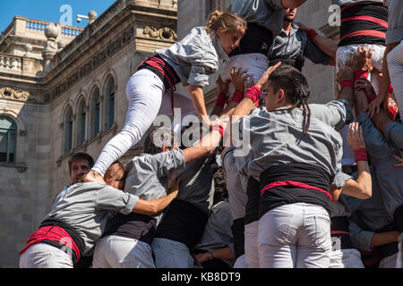 One of Catalonia’s most famous traditions is that of the “castells” (castles), which are human towers that are lifted by building different levels of  Stock Photo