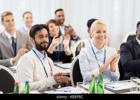 people applauding at business conference Stock Photo