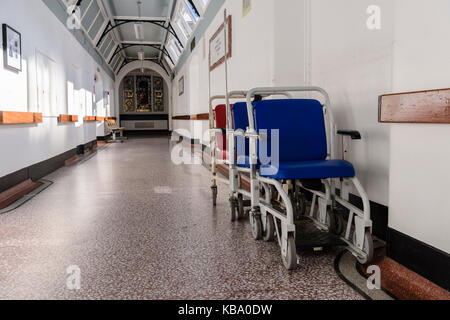 Wheelchairs parked in a hospital corridor. Stock Photo