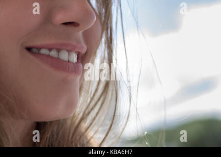 Cropped image of a smiling woman Stock Photo