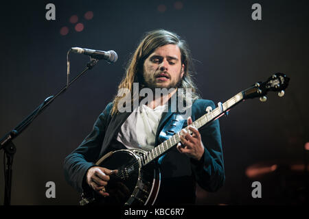 The British folk rock band Mumford & Sons performs a live concert at Oslo Spektrum. Here musician Winston Marshall on banjo is seen live on stage. Norway, 10/05 2016. Stock Photo