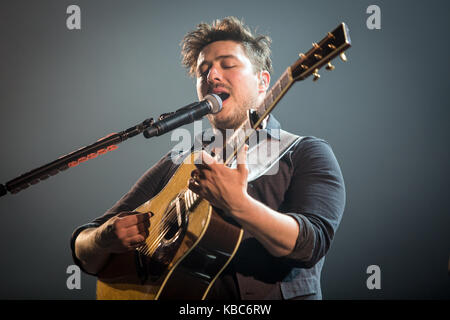 The British folk rock band Mumford & Sons performs a live concert at Oslo Spektrum. Here singer, songwriter and musician Marcus Mumford is seen live on stage. Norway, 10/05 2016. Stock Photo