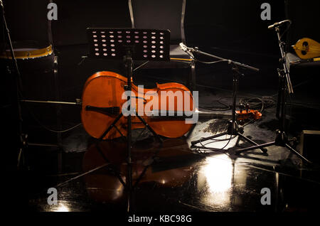 cello music instruments orchestra music on a stage concert hall Stock Photo