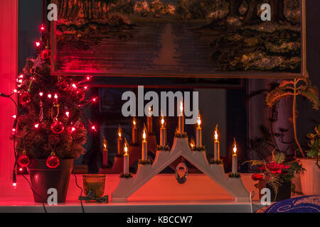 Christmas still life - Advent electric candles on window sill Stock Photo