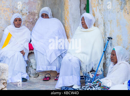 Ethiopian Orthodox worshipers waiting for the Holy fire ceremony to begin at the Ethiopian section of the Holy Sepulcher in Jerusalm Israel Stock Photo