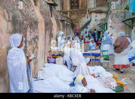 Ethiopian Orthodox worshipers waiting for the Holy fire ceremony to begin at the Ethiopian section of the Holy Sepulcher in Jerusalm Israel Stock Photo