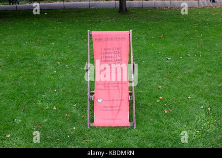Deckchair rental prices (2017) in St. James's Park in London, England. Stock Photo