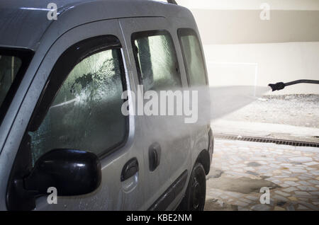 car washing cleaning car using high pressure water Stock Photo