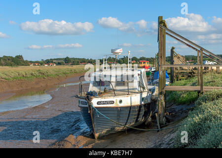 Various boats moored at Thornham, in Norfolk. Stock Photo