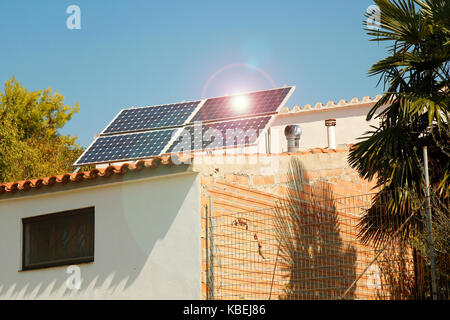 Solar panels on roof. Rural house at Penelles, Lleida, Catalonia, Spain. Stock Photo