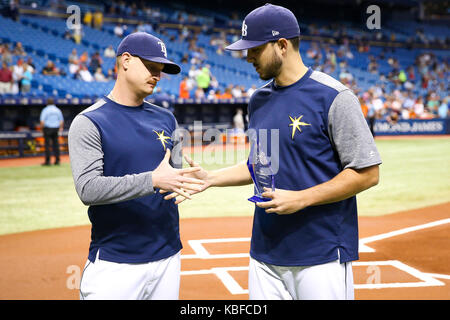 St. Petersburg, Florida, USA. 29th Sep, 2017. WILL VRAGOVIC | Times.Tampa Bay Rays starting pitcher Alex Cobb (53) shakes hands with starting pitcher Jacob Faria (34) after he was presented with the Most Outstanding Rookie award from the BWAA before the start of the game between the Baltimore Orioles and the Tampa Bay Rays at Tropicana Field in St. Petersburg, Fla. on Friday, Sept. 29, 2017. Credit: Will Vragovic/Tampa Bay Times/ZUMA Wire/Ģ����ý Live News Stock Photo