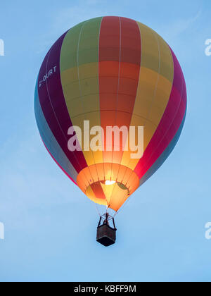 York, UK. 30th September, 2017. A mass balloon launch took place at sunrise from York Knavesmire as part of the first ever York Balloon Fiesta. Over 30 balloons took to the skies watched by hundreds of onlookers. The launch is part of a three day event which runs until Sunday the 1st of October. Photo Bailey-Cooper Photography/Alamy Live News Stock Photo