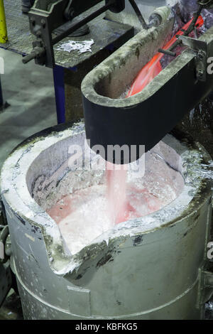 smelting of aluminum metal in the ladle closeup Stock Photo