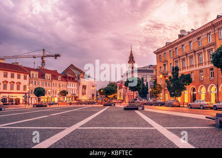 Vilnius, Lithuania: the Town Hall square, Lithuanian Vilniaus rotuses aikste, in the sunrise Stock Photo