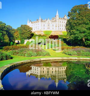 A sunny view of historic Dunrobin Castle looking across its extensive walled garden. Stock Photo
