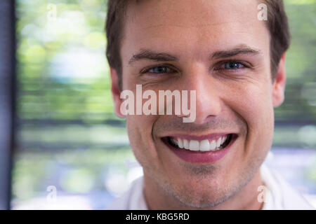 Close up portrait of smiling doctor at clinic Stock Photo